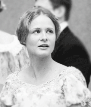 Olga as Laura Wilson Elliott